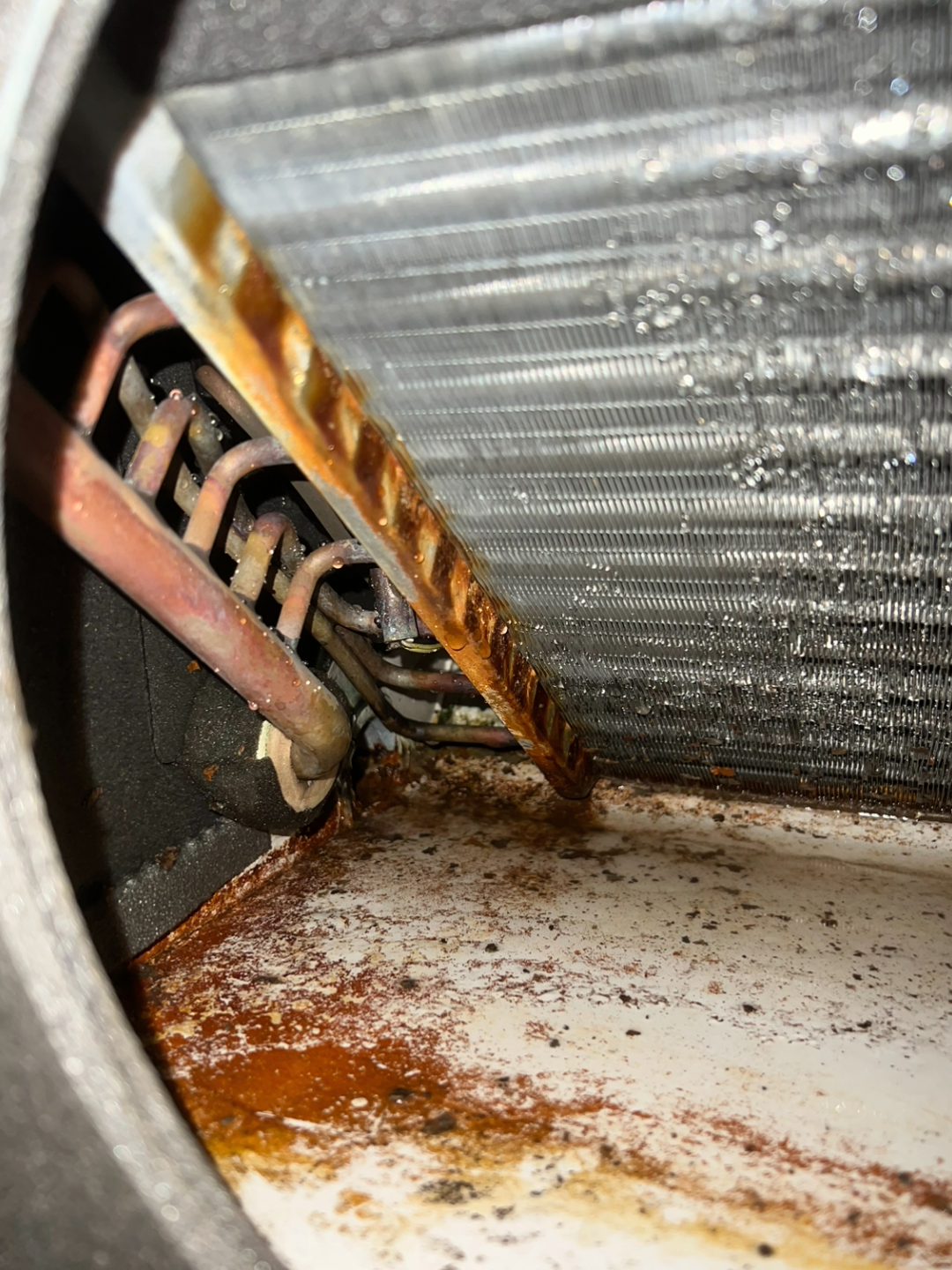 Rust and corrosion in air conditioning drip tray
