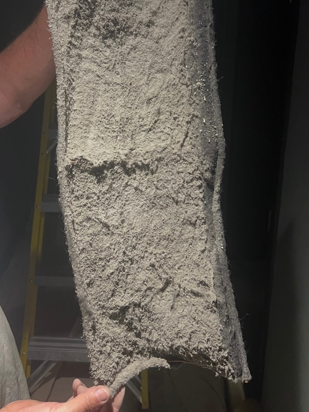 Dirty air conditioning filter clogged with dust and debris