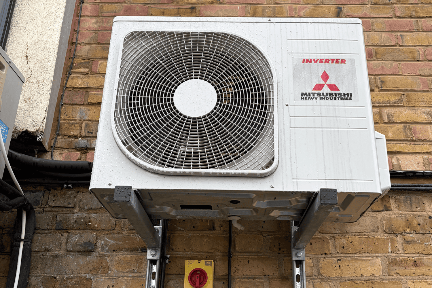 Wall mounted unit installed at Guildford and Godalming Rugby Club