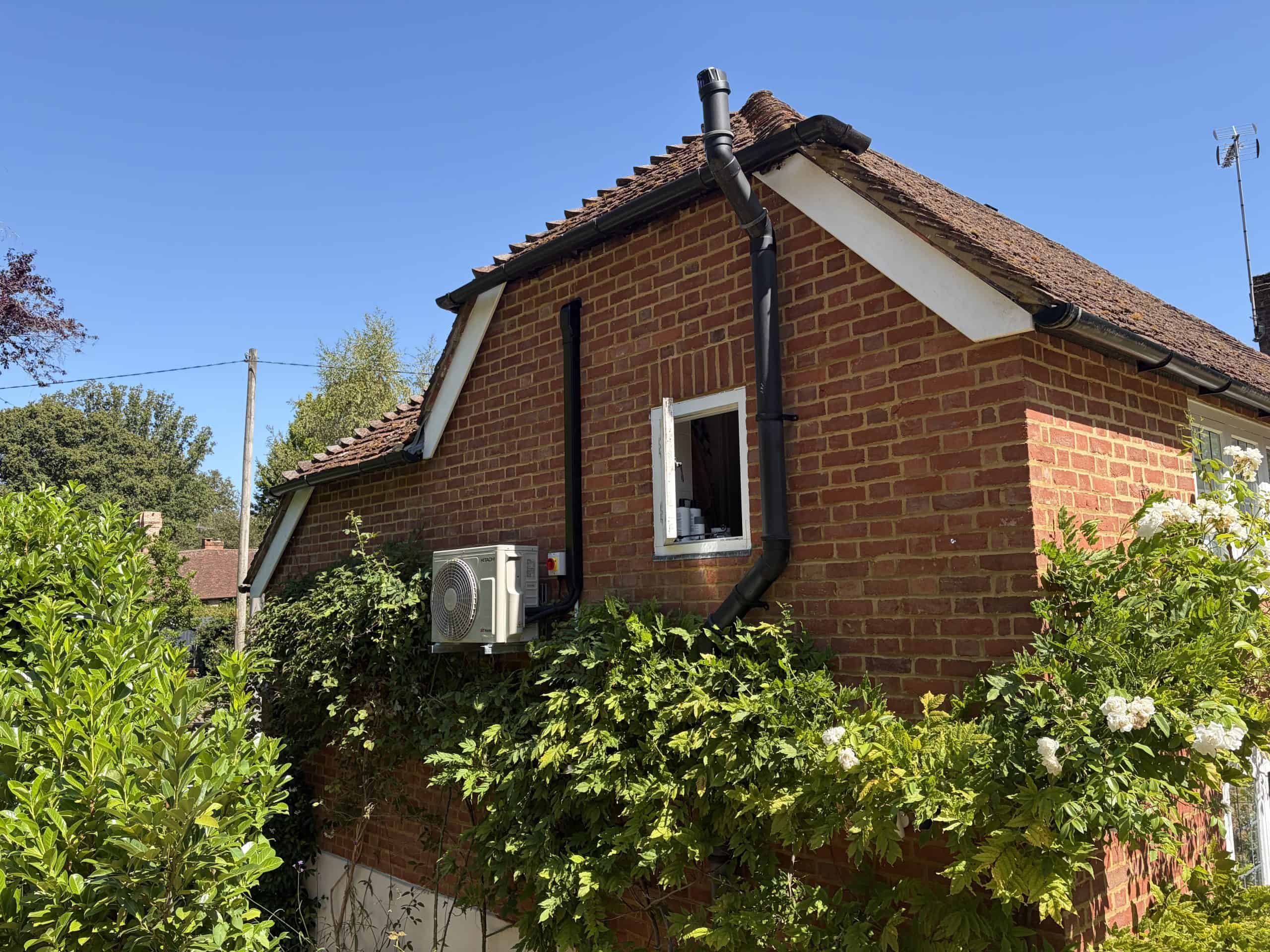 Wall-mounted air conditioning installed in a Godalming bedroom